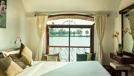 Bedroom in the houseboat Xandari Riverscapes Allepey Kerala